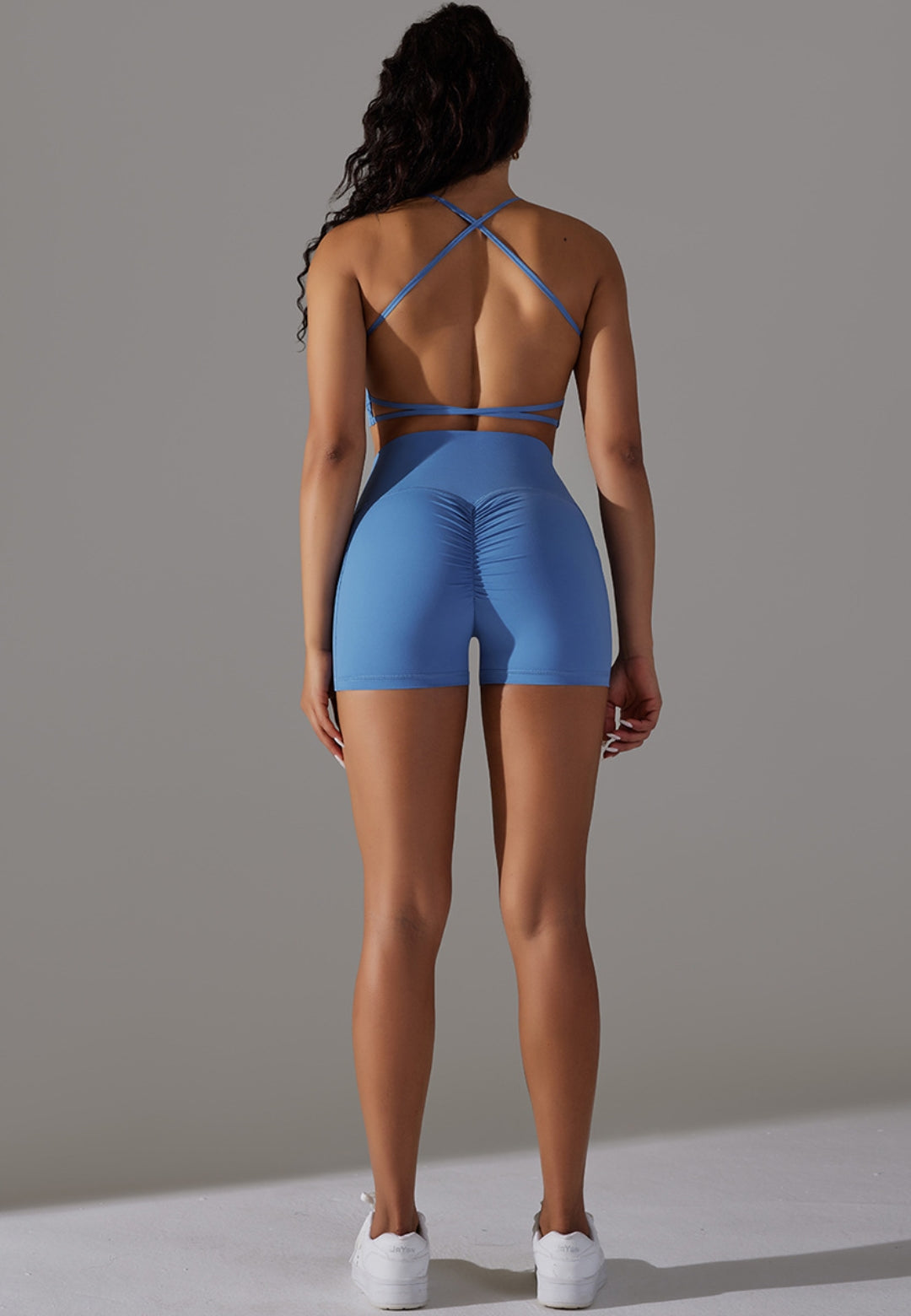 Conjunto deportivo sin espalda en color liso