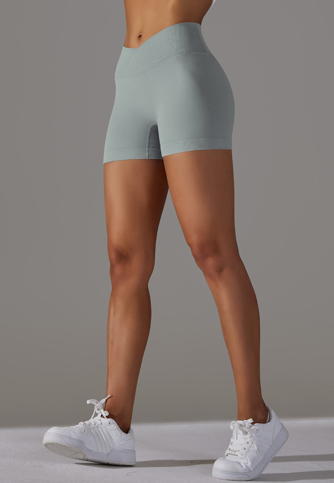 Pantalones cortos con cintura en V y canalé superpuesto