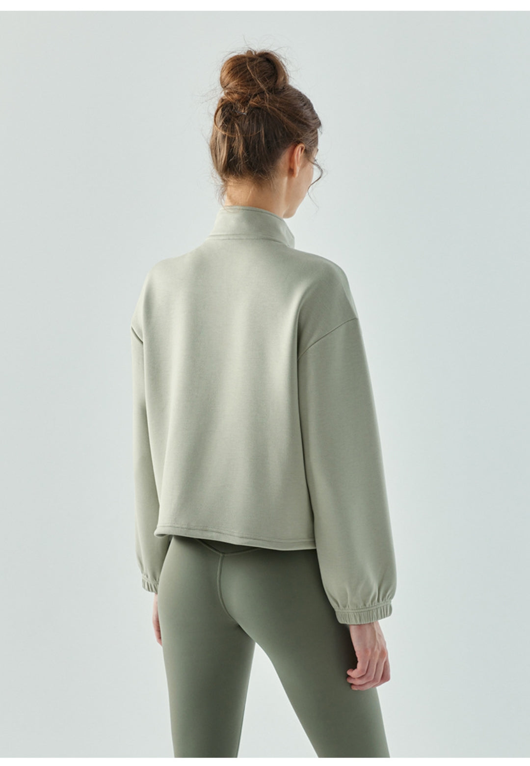 Suéter de cuello alto con dobladillo con cordón ajustable