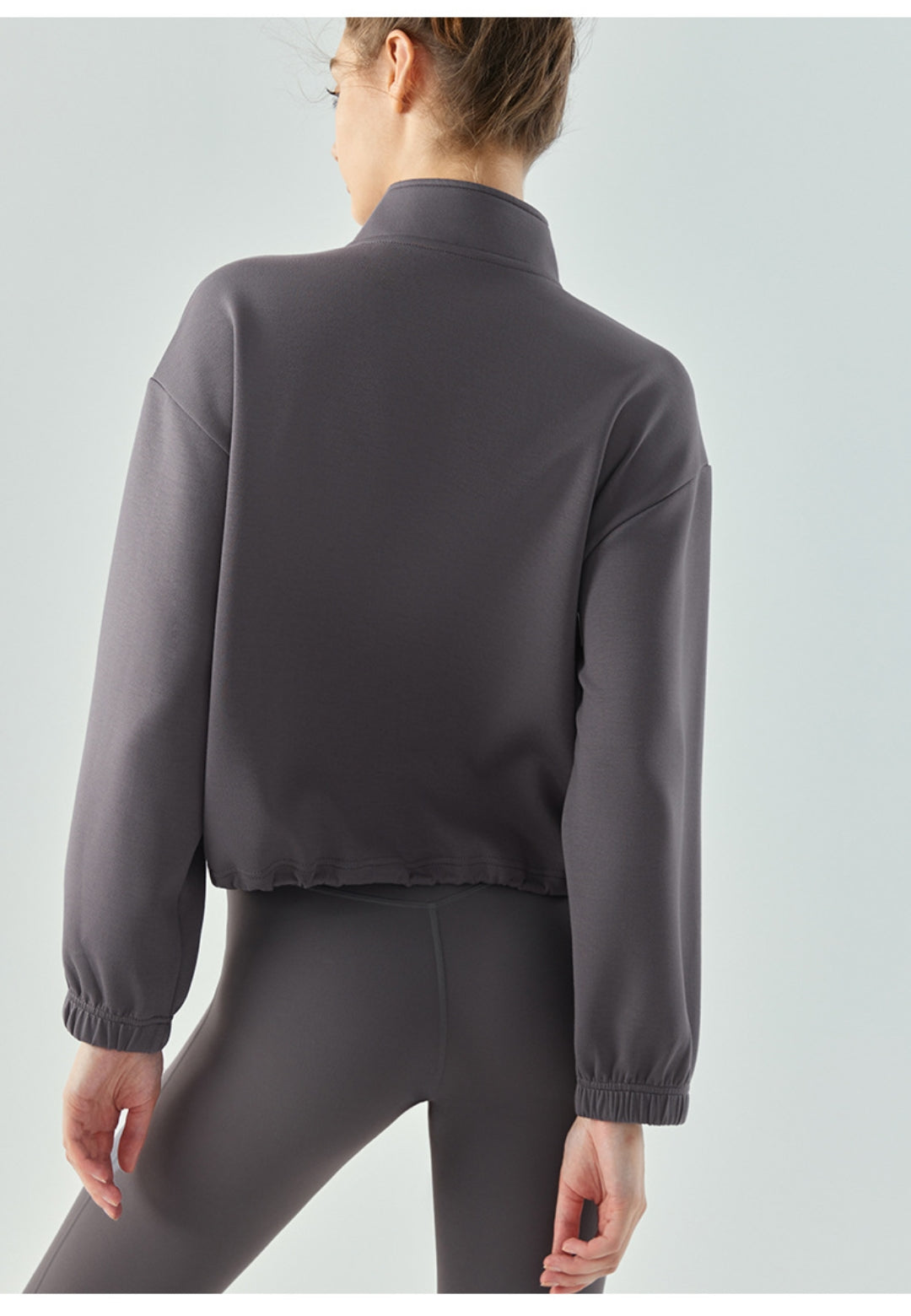 Suéter de cuello alto con dobladillo con cordón ajustable