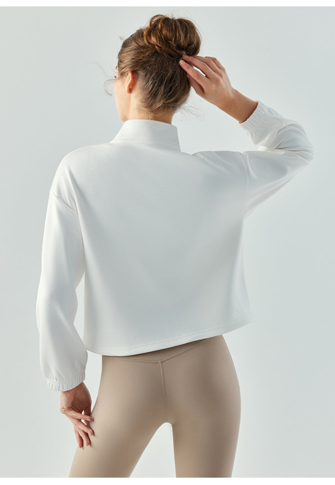 Suéter de cuello alto con dobladillo con cordón ajustable