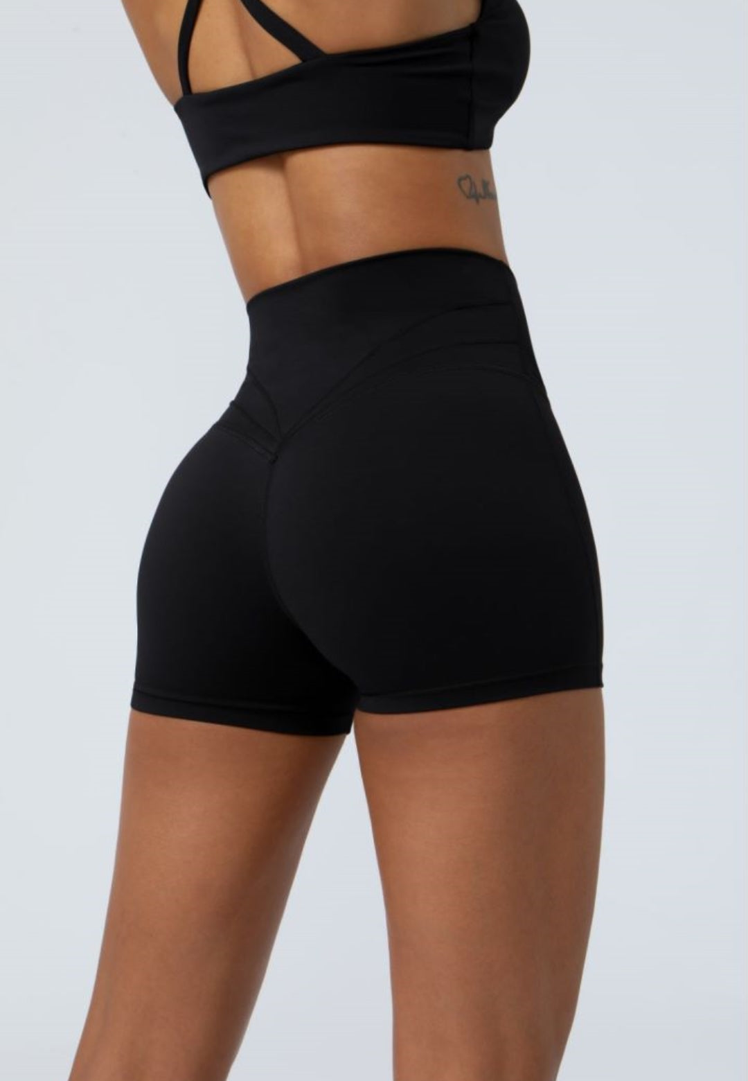 Pantalones cortos elásticos de cintura alta para correr, fitness y con cintura cruzada