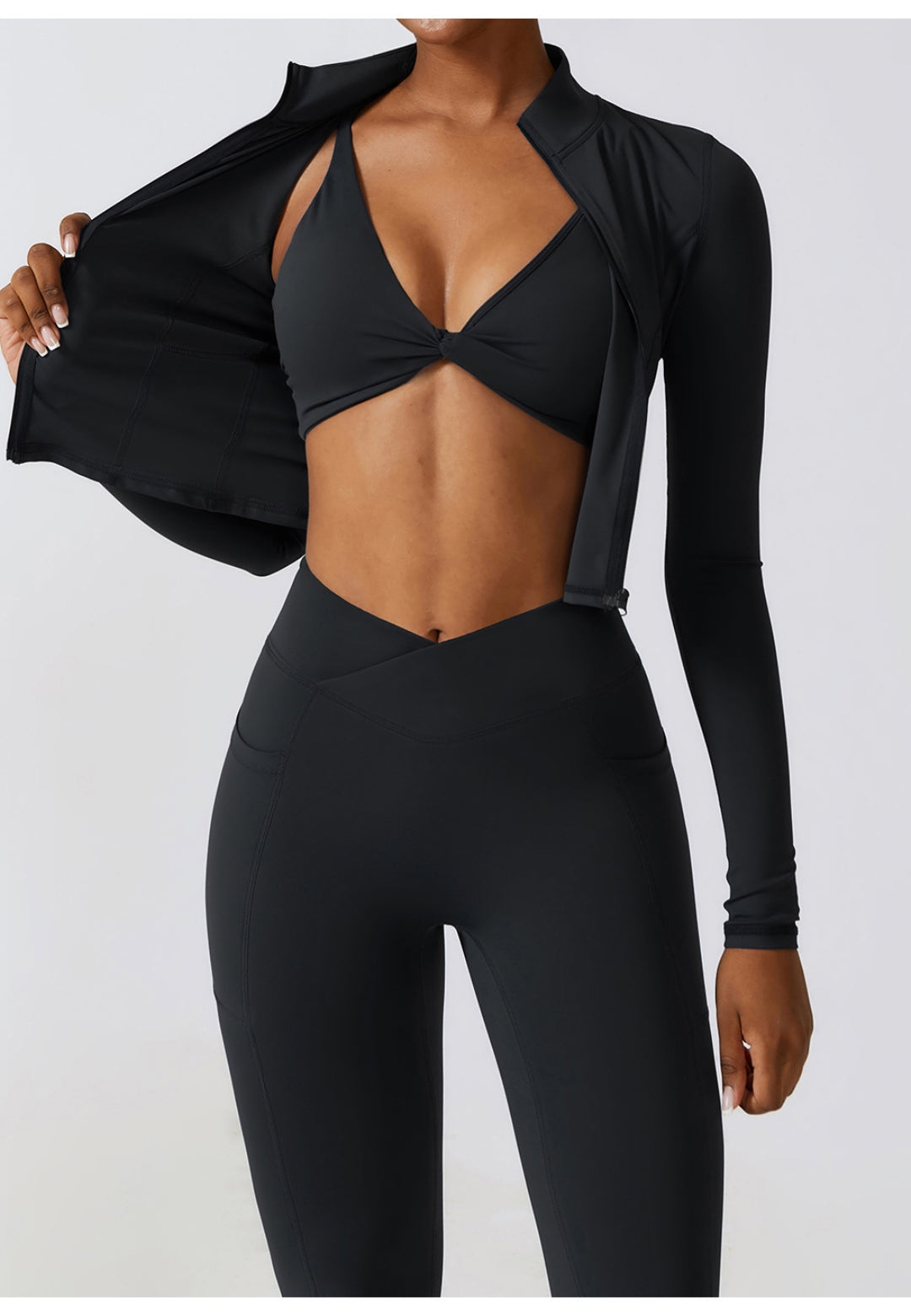 Chaqueta deportiva con cuello alto y cremallera