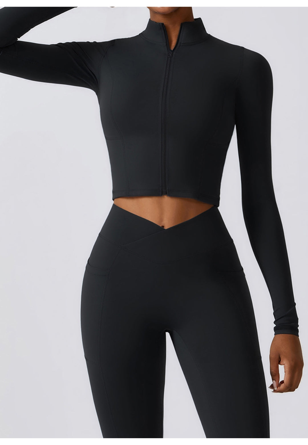 Chaqueta deportiva con cuello alto y cremallera