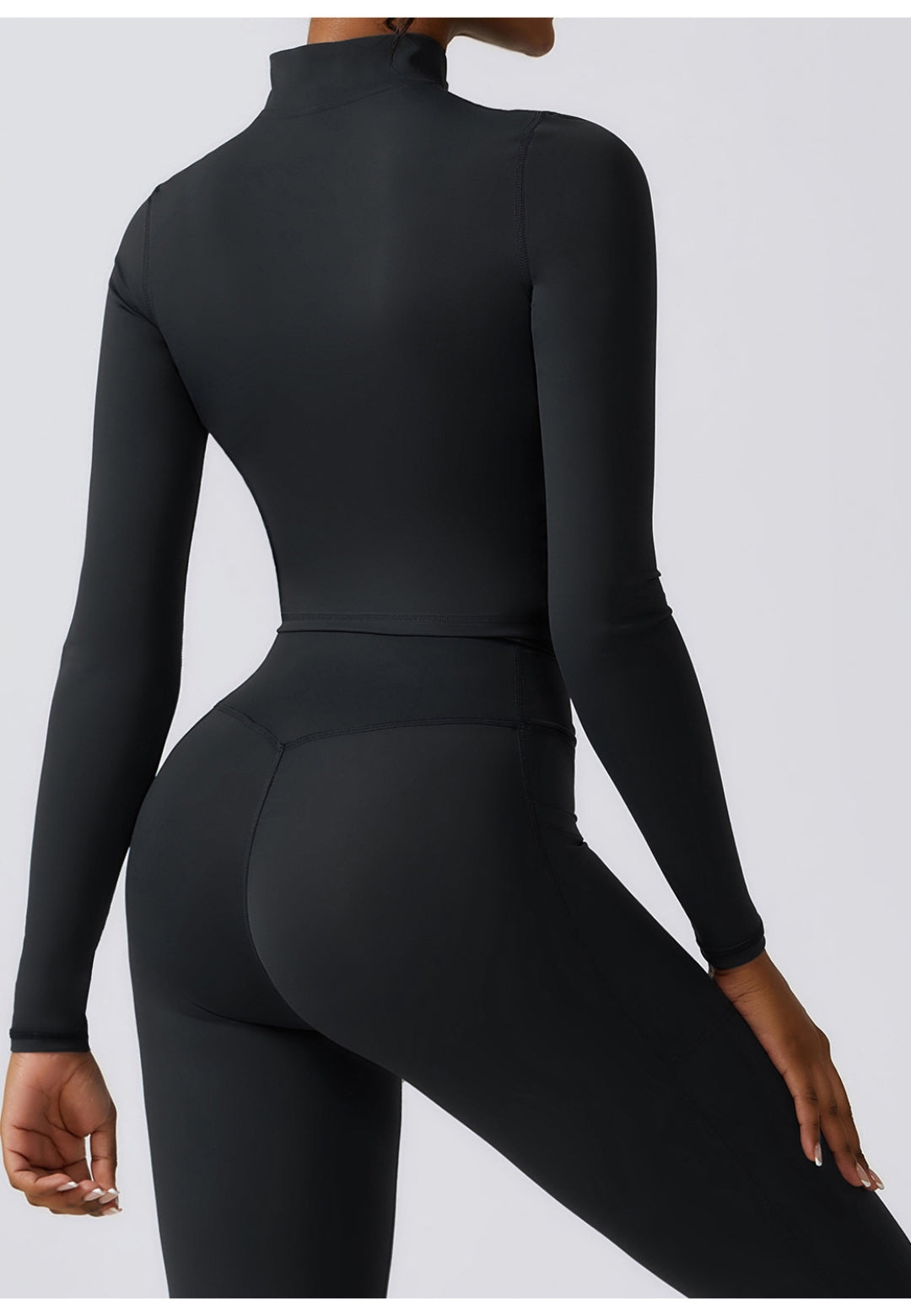 Chaqueta deportiva con cuello alto y cremallera