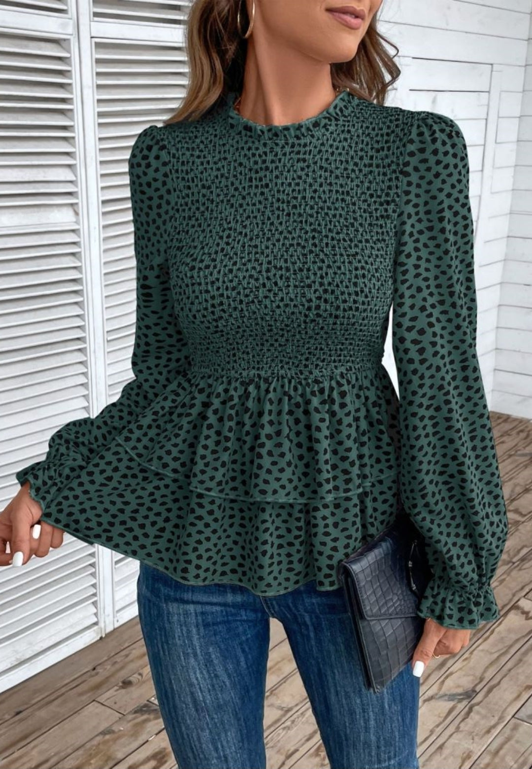 Blusa peplum con capas y estampado de guepardo