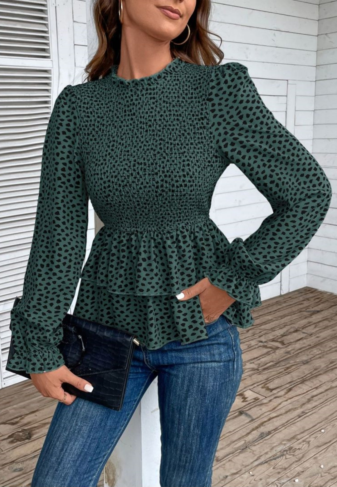 Blusa peplum con capas y estampado de guepardo