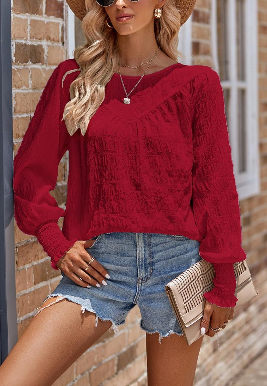 Blusa texturizada con puños fruncidos