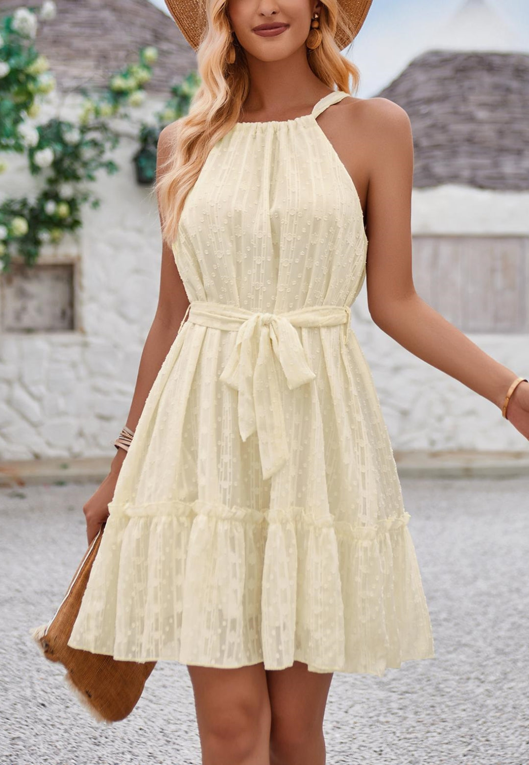 Vestido con textura geométrica y lazo en la espalda