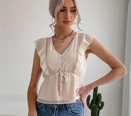 Blusa peplum con volantes y lunares suizos