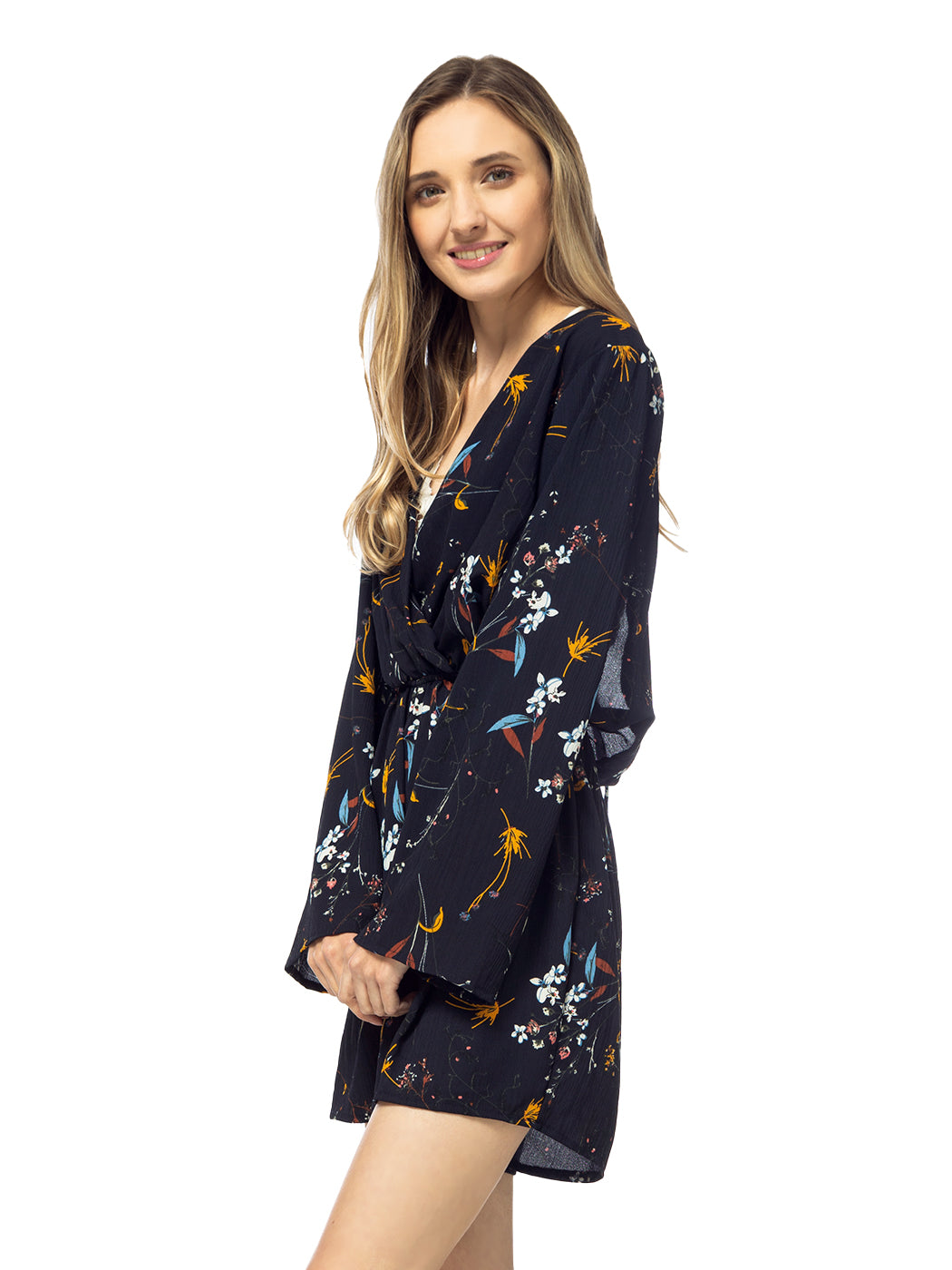 Mono de manga larga sin espalda con estampado floral