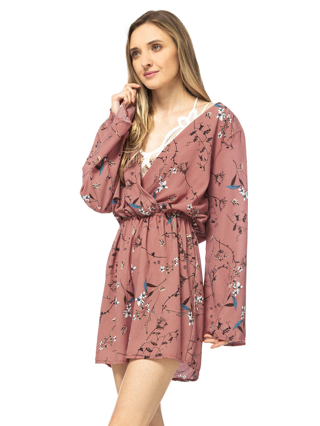Mono de manga larga sin espalda con estampado floral