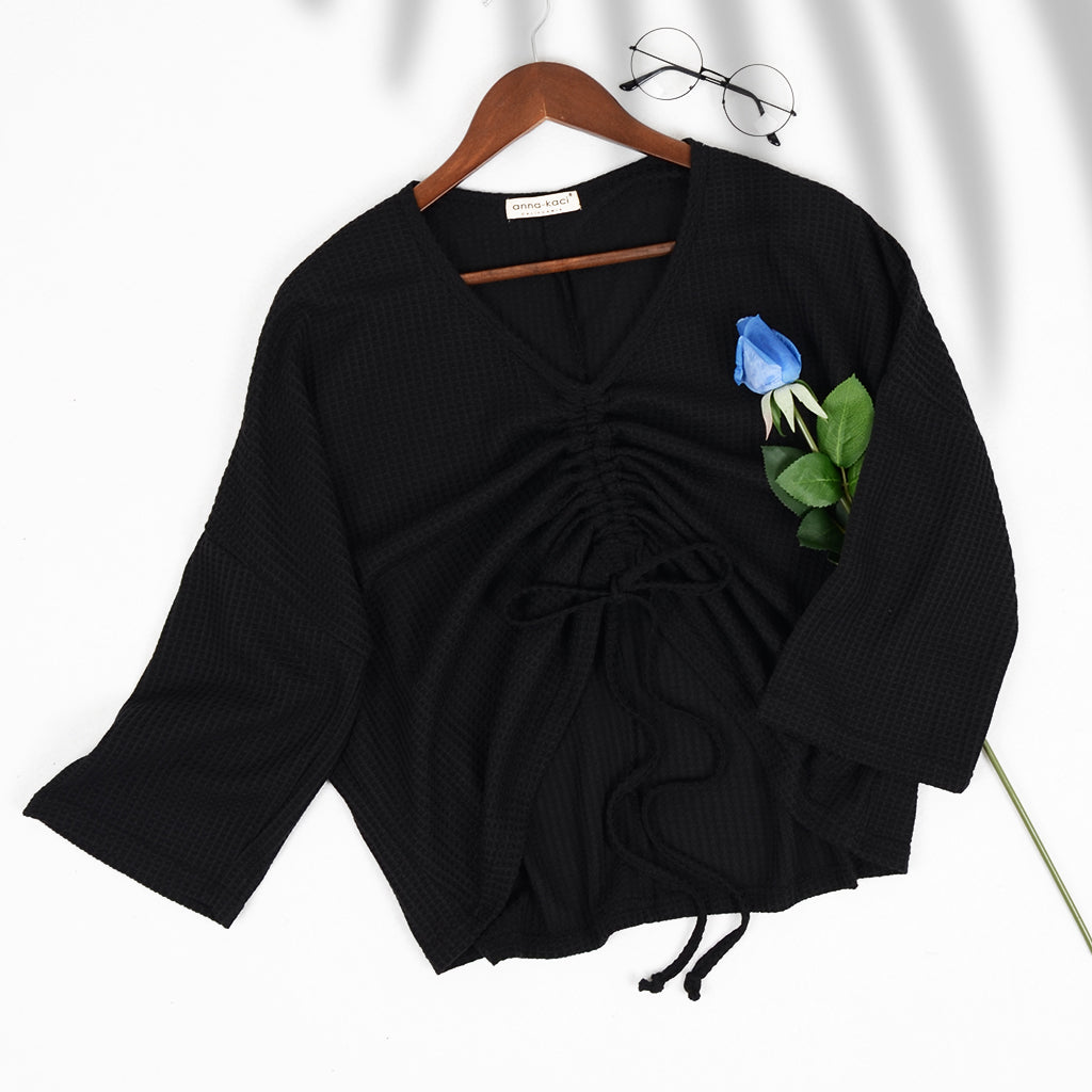 Blusa de manga fruncida con tejido gofre