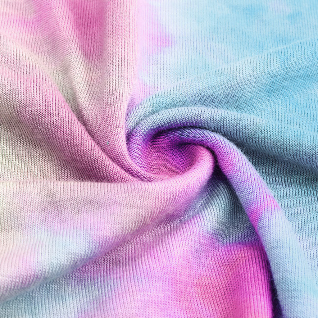 Top holgado de manga corta con estampado tie-dye y rasgado