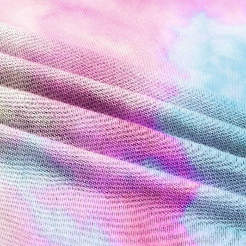 Top holgado de manga corta con estampado tie-dye y rasgado