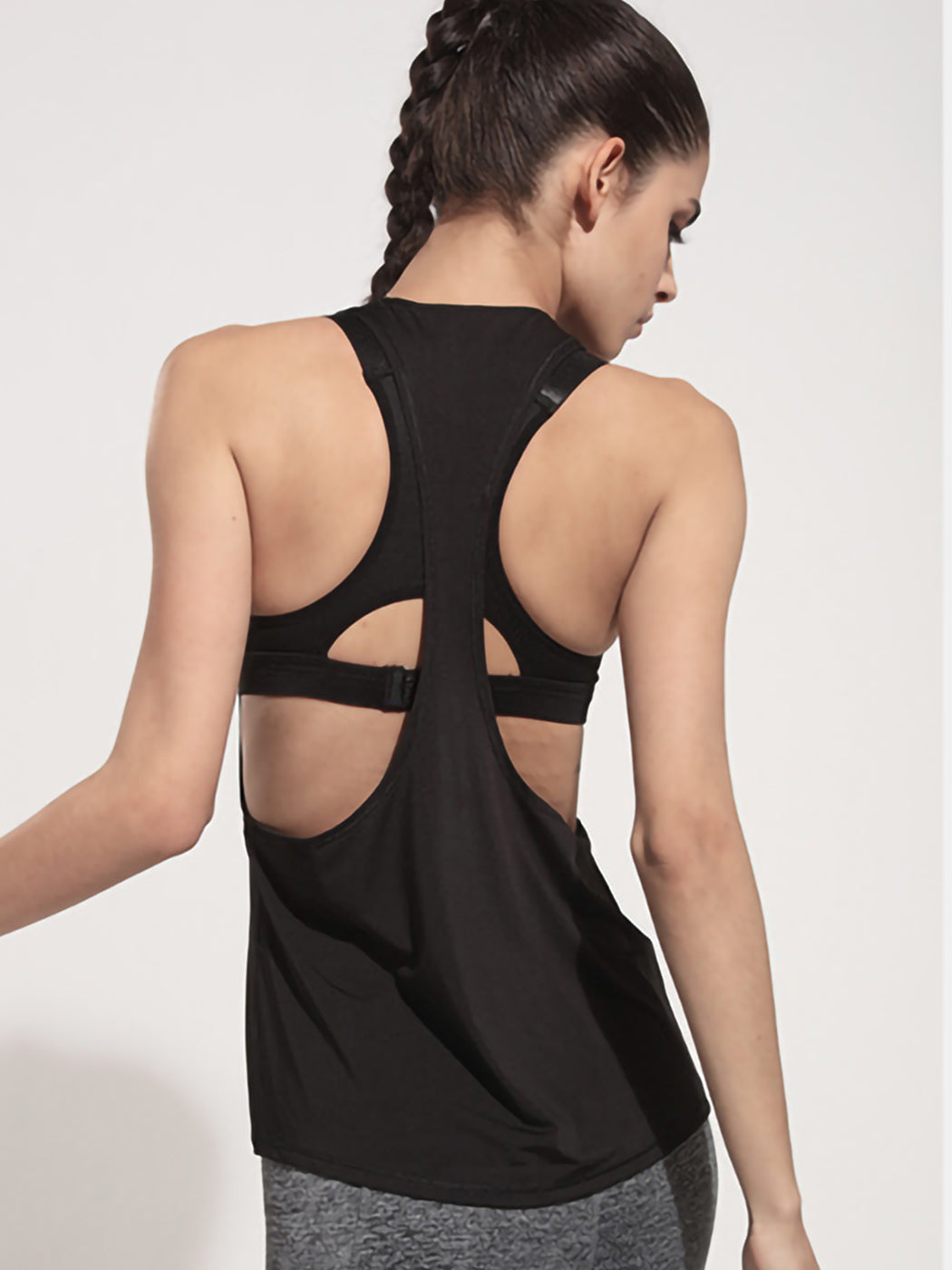 Camiseta sin mangas holgada con espalda cruzada para hacer yoga