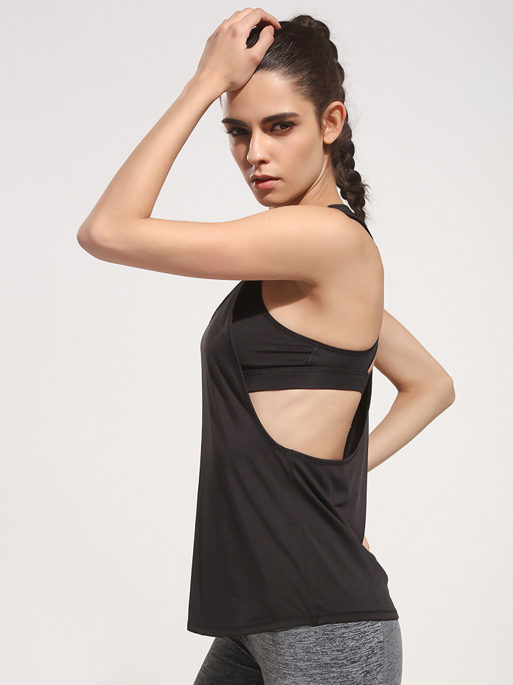 Camiseta sin mangas holgada con espalda cruzada para hacer yoga