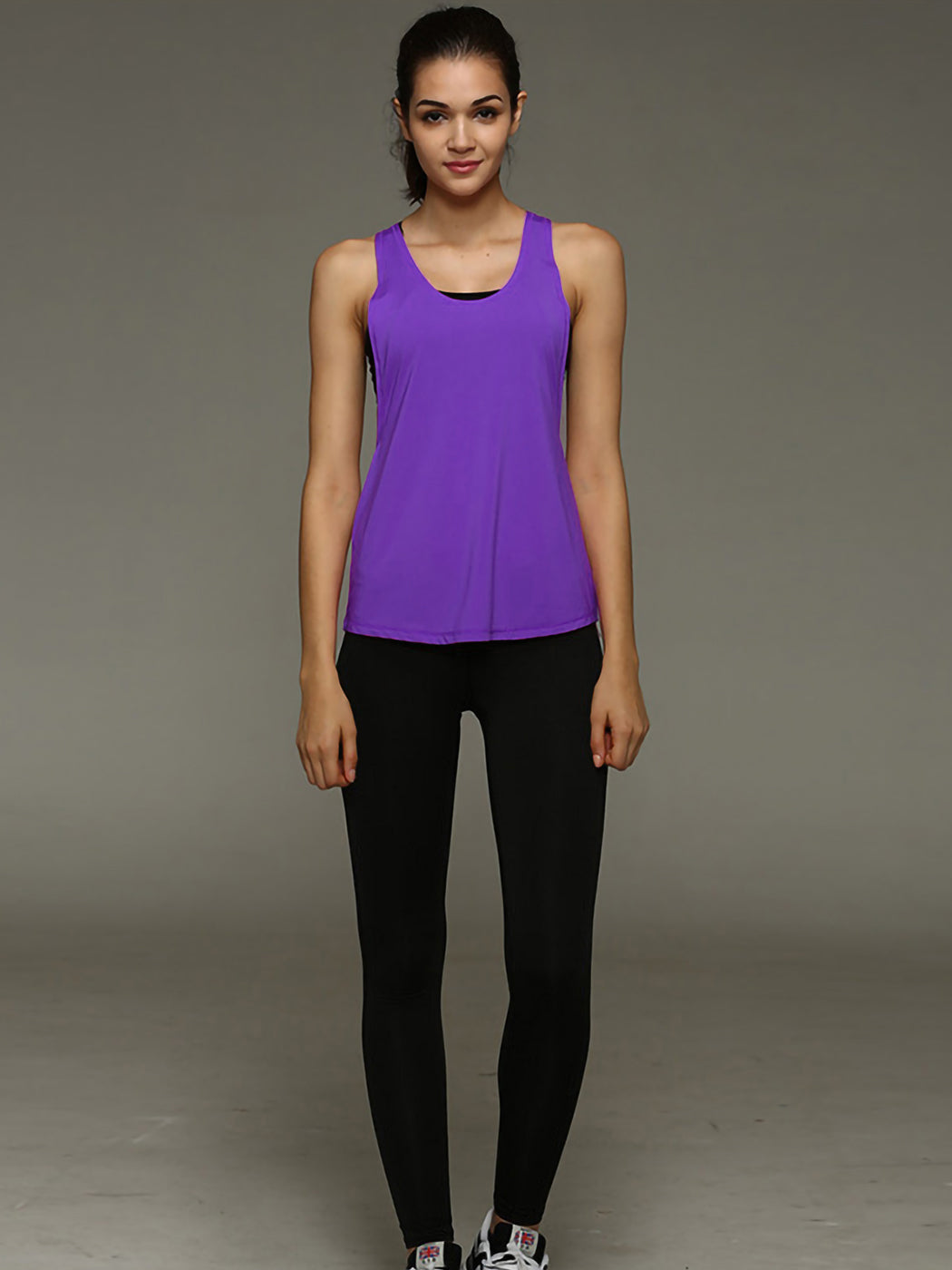 Camiseta sin mangas holgada con espalda cruzada para hacer yoga