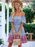 Vestido acampanado con hombros abullonados y estampado floral bohemio