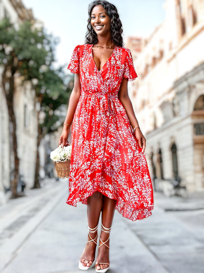 Vestido cruzado con mangas abullonadas y estampado floral 
