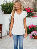 Blusa de dos capas con detalle de malla y mangas con vuelo y escote en V