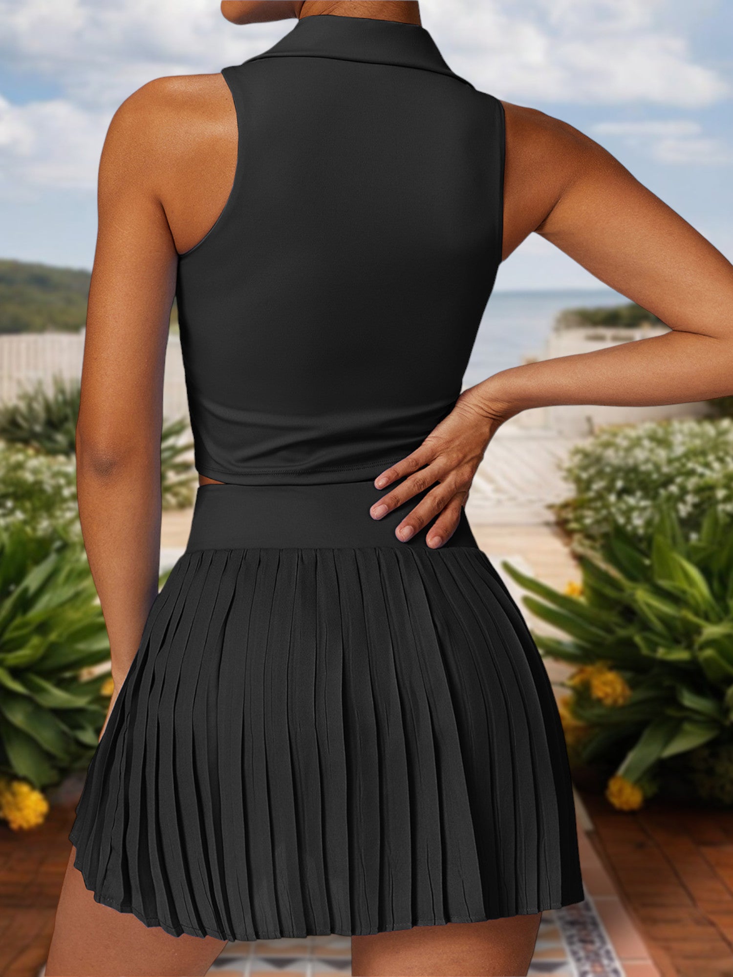 Top corto tipo polo sin mangas para mujer con escote con cuello y corte elástico