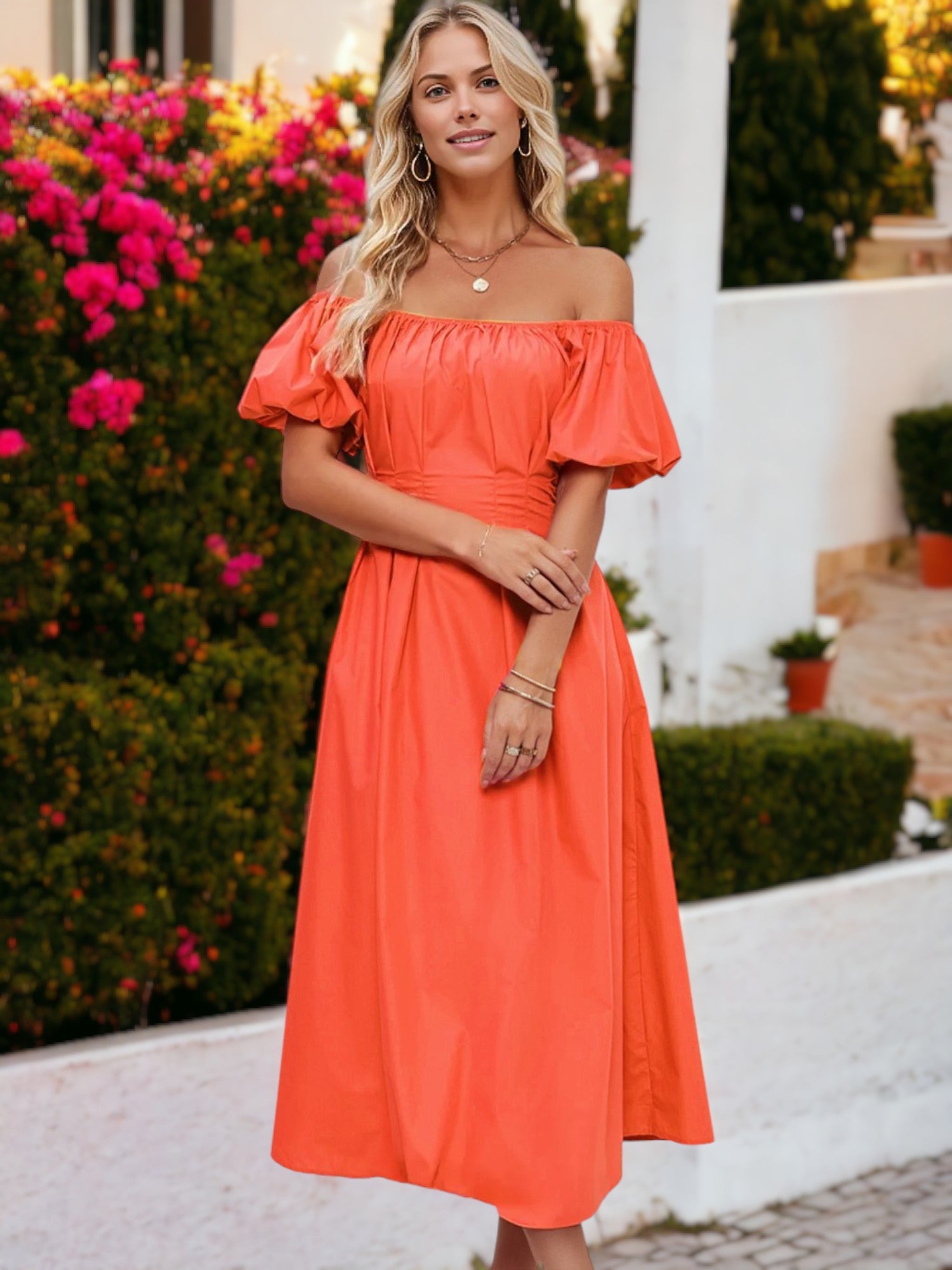 Vestido de largo medio con detalle plisado, mangas abullonadas y hombros descubiertos