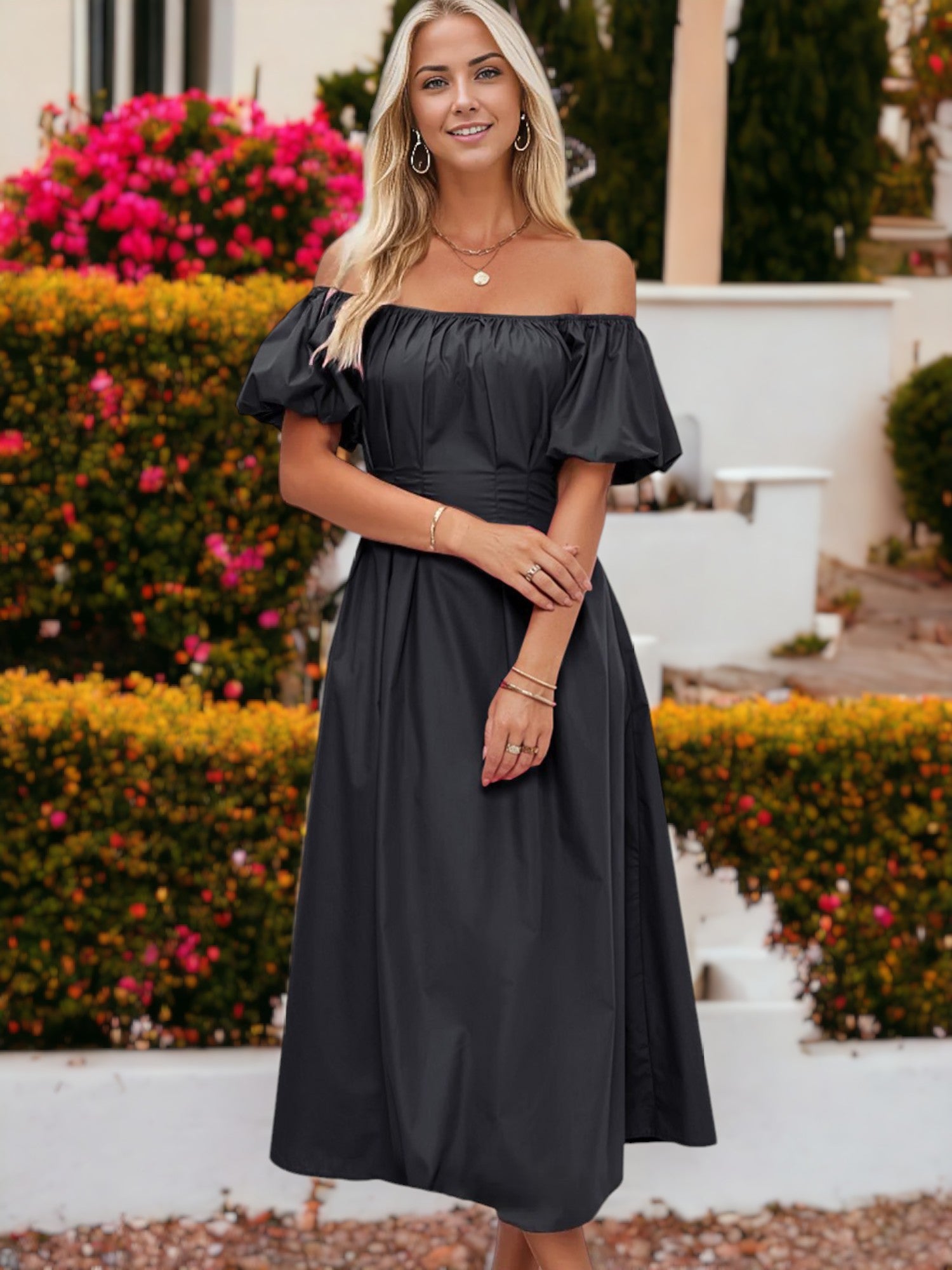 Vestido de largo medio con detalle plisado, mangas abullonadas y hombros descubiertos