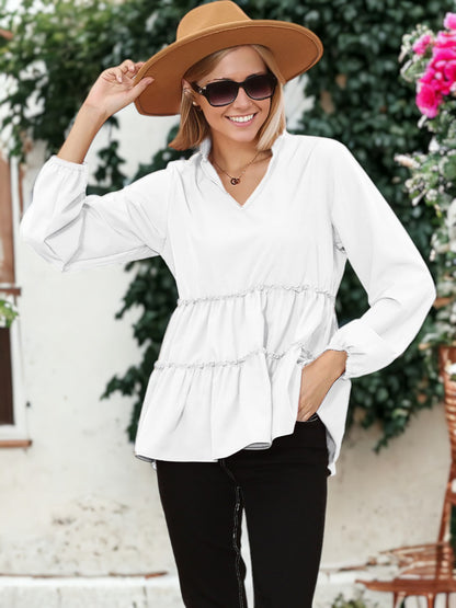 Blusa con cuello mandarín y dobladillo con volantes