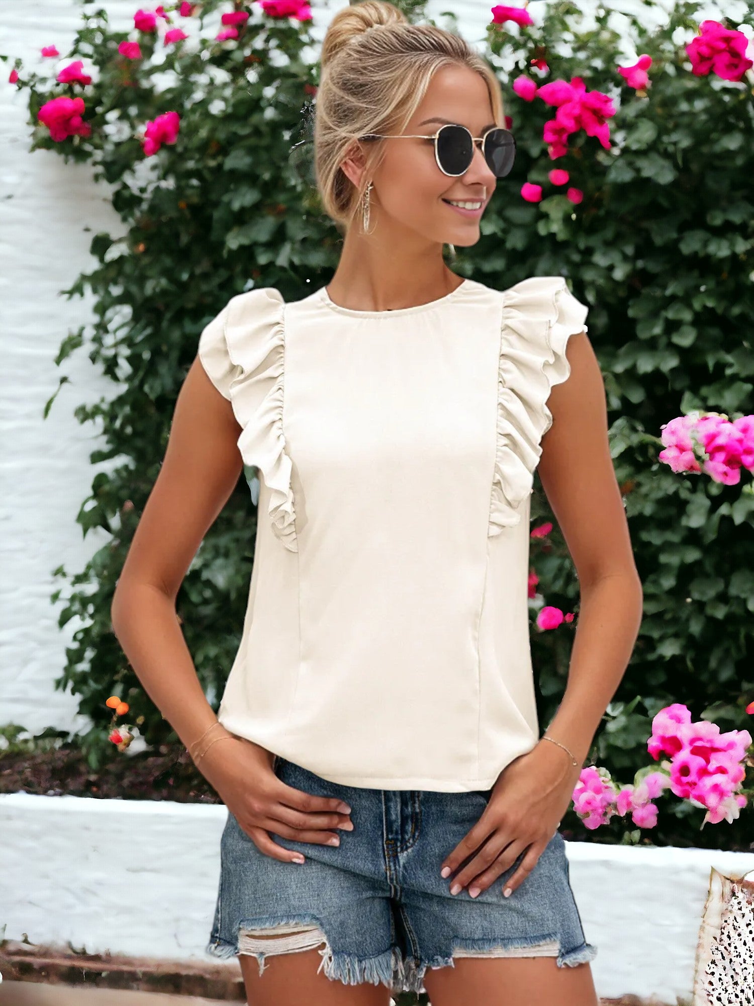 Blusa sin mangas con volantes y espalda abierta