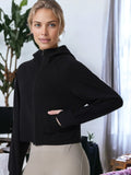 Chaqueta deportiva holgada de manga larga con capucha