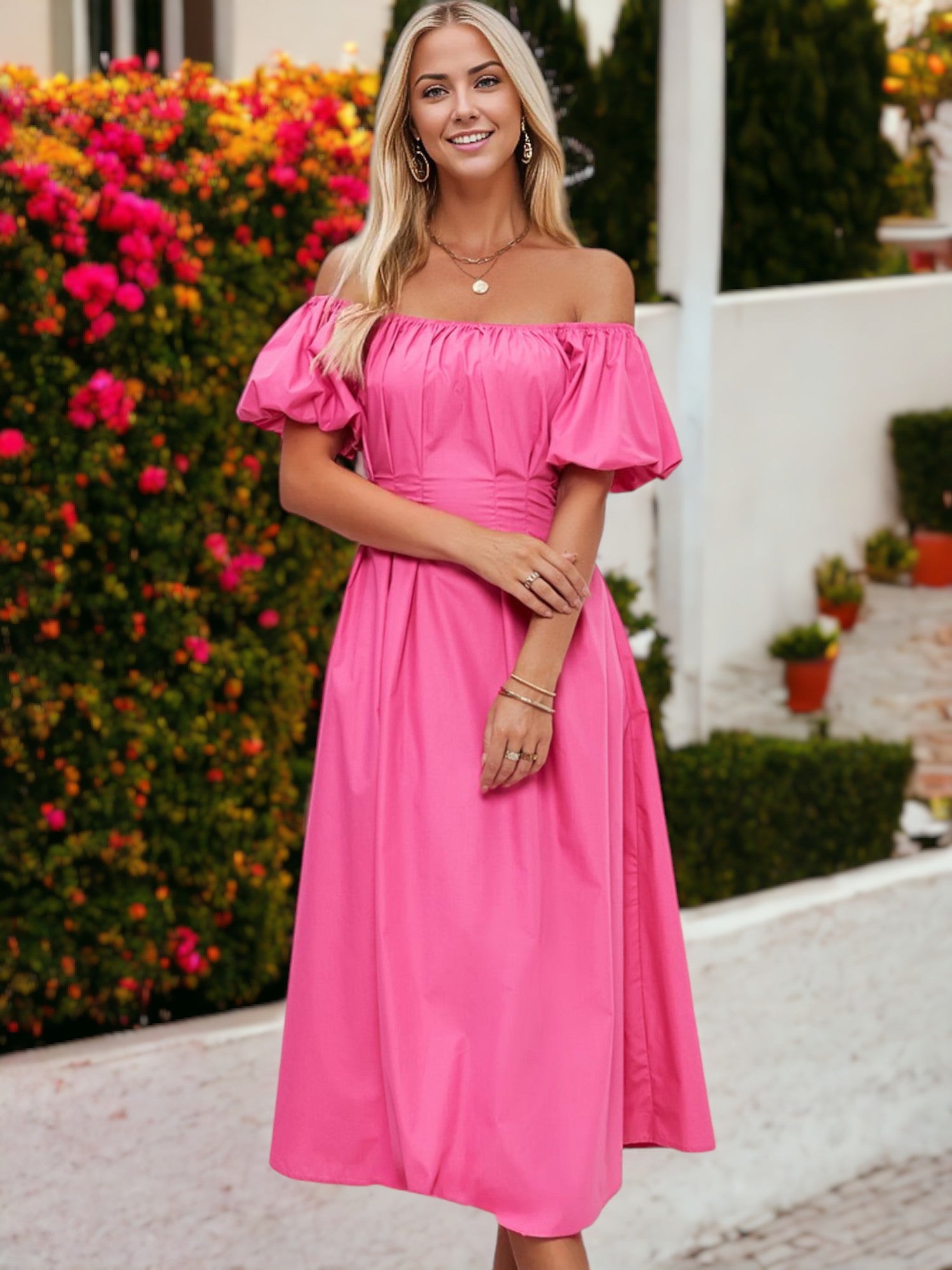 Vestido de largo medio con detalle plisado, mangas abullonadas y hombros descubiertos