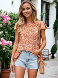 Camisa floral con cuello alto y mangas de hoja de loto