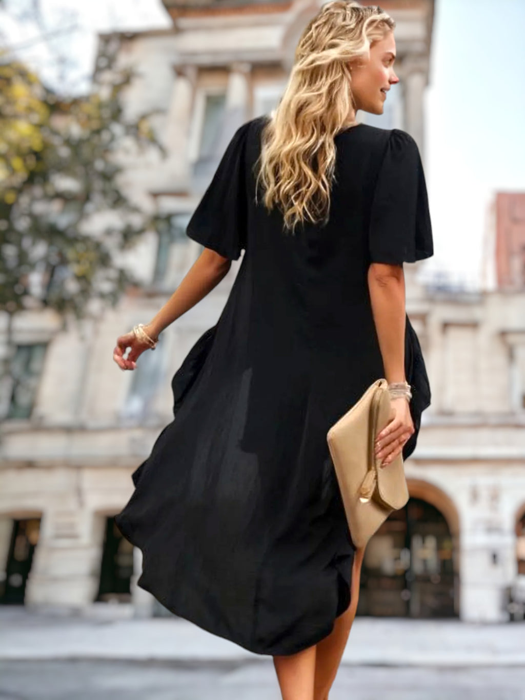 Top de corte alto y bajo con detalle de volantes
