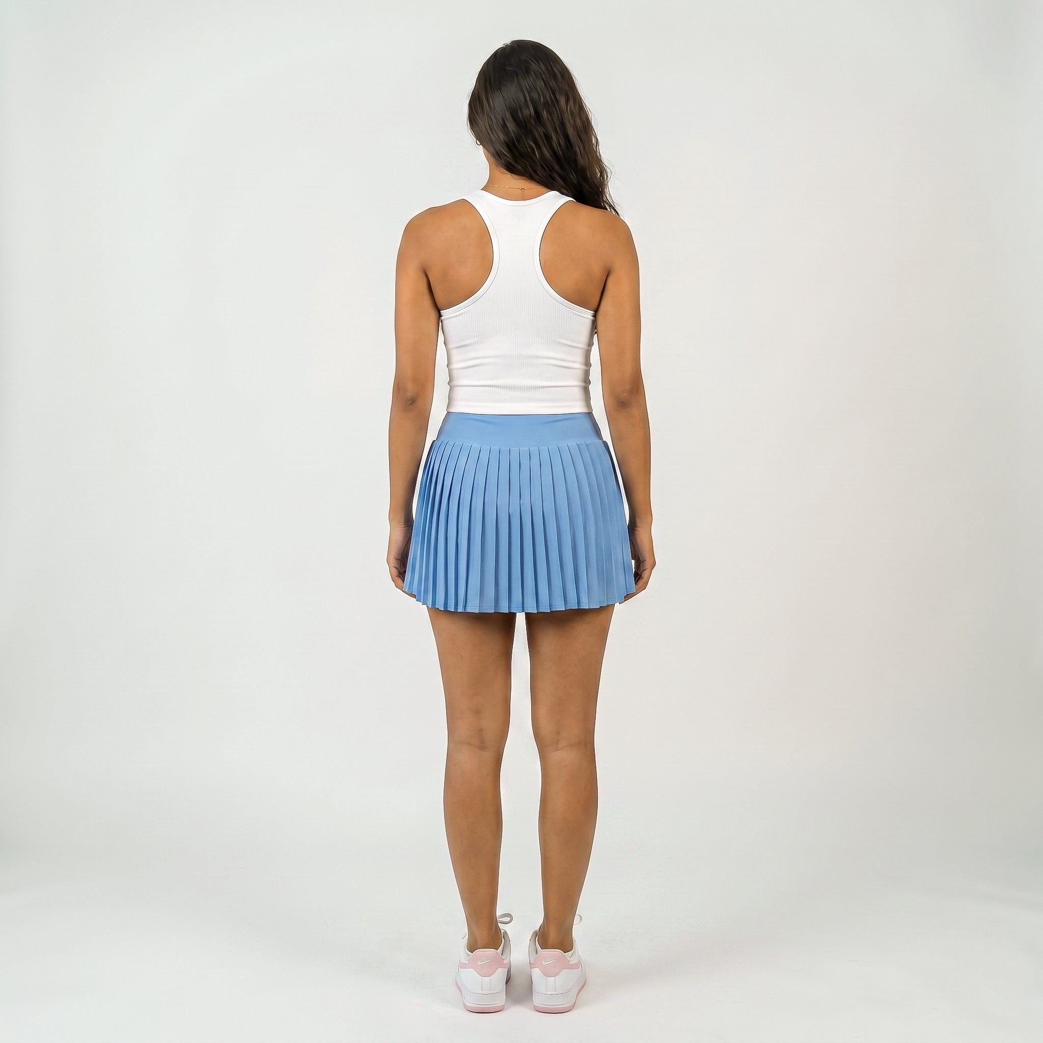 Falda pantalón deportiva plisada de cintura alta para mujer con pantalones cortos incorporados