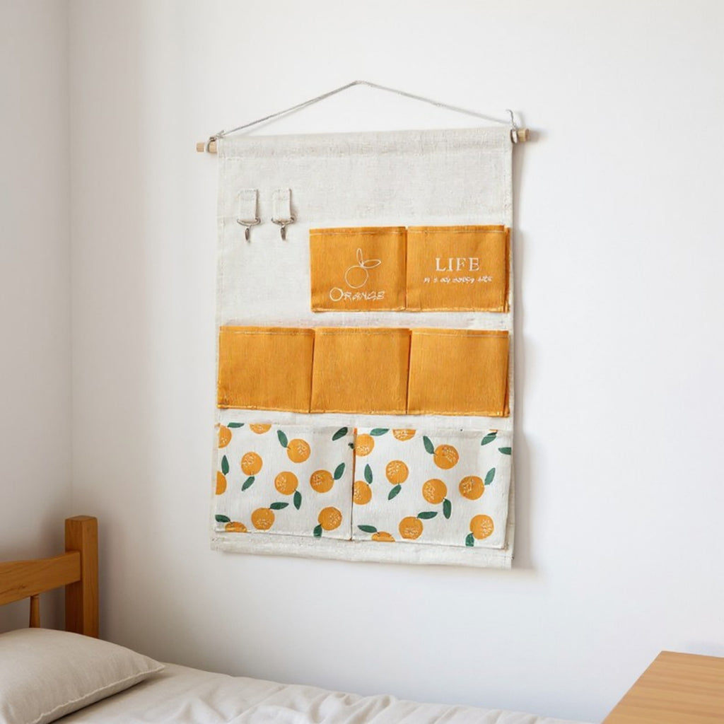 Anna-Kaci Hanging Wall Storage Organizer with Multiple Fabric Pockets and Orange Fruit Print Design