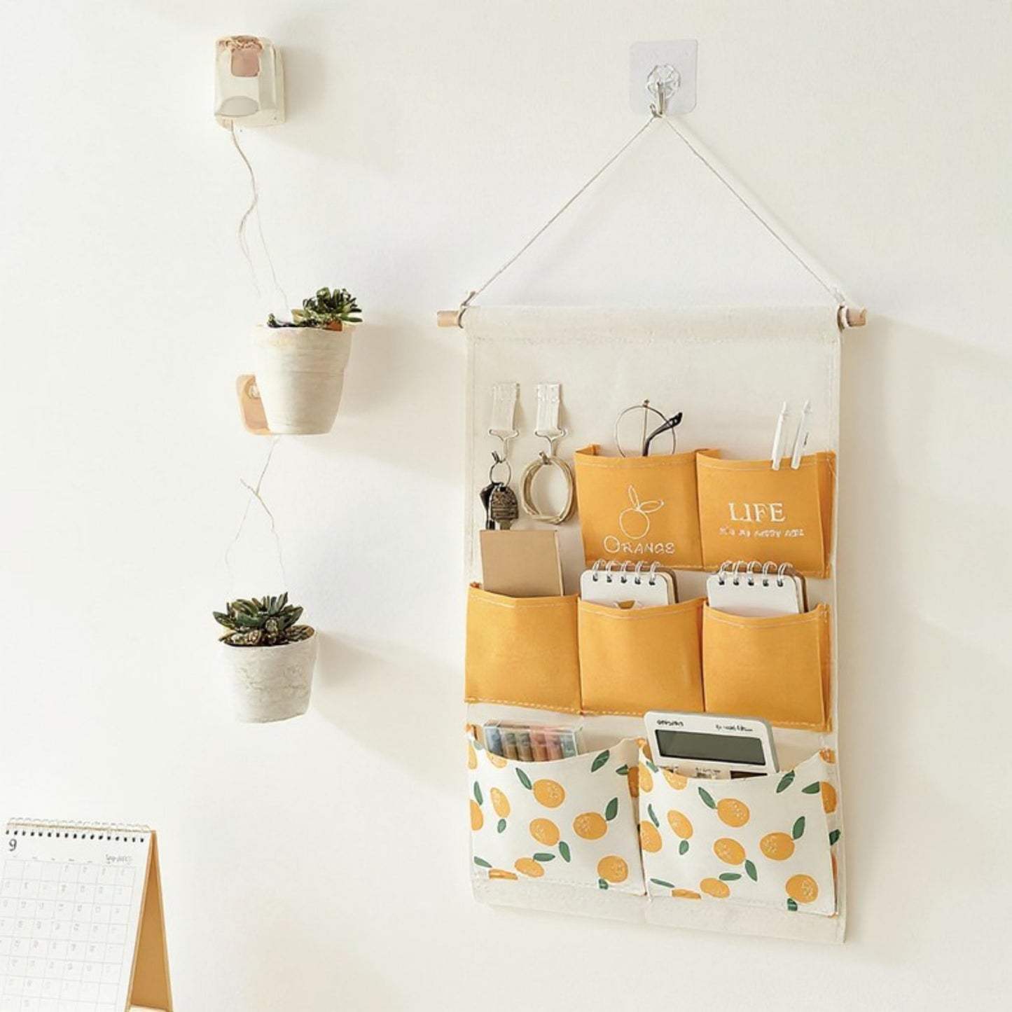 Anna-Kaci Hanging Wall Storage Organizer with Multiple Fabric Pockets and Orange Fruit Print Design