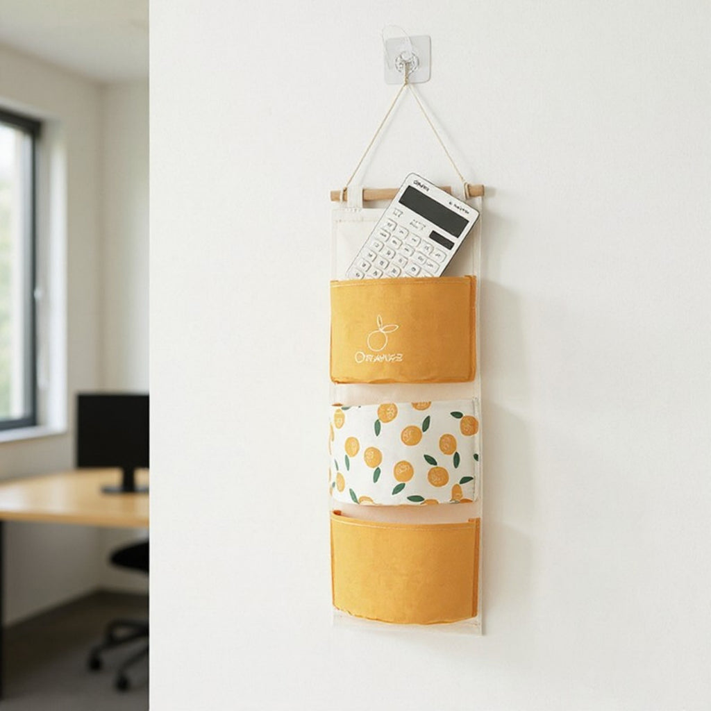 Anna-Kaci Hanging Wall Storage Organizer with Multiple Fabric Pockets and Orange Fruit Print Design