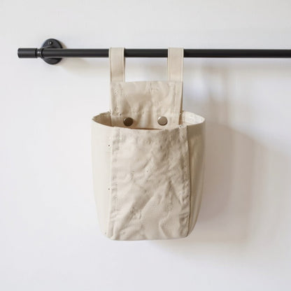 Anna-Kaci Hanging Wall Storage Basket with Front Pocket and Reinforced Canvas Construction
