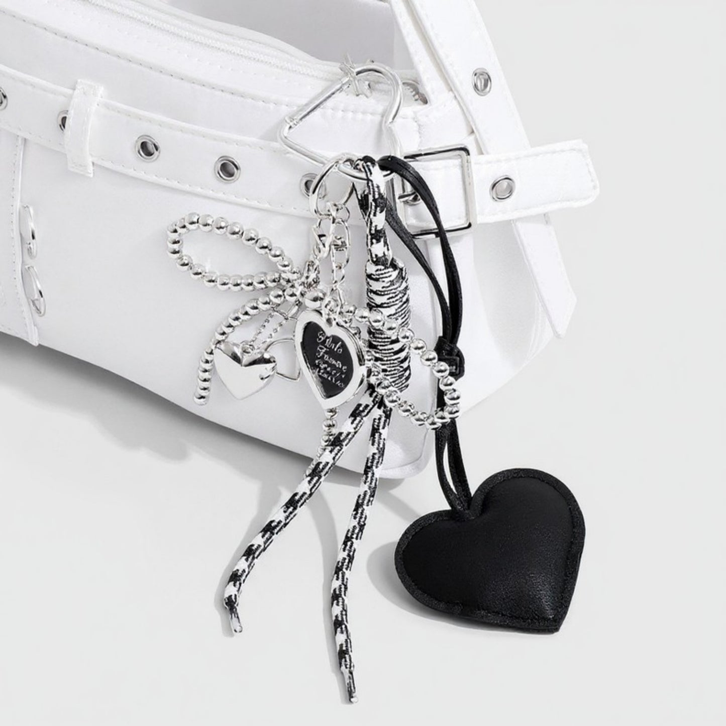 Anna-Kaci Heart Charm Keychain with Silver Chain Details and Bow Accent