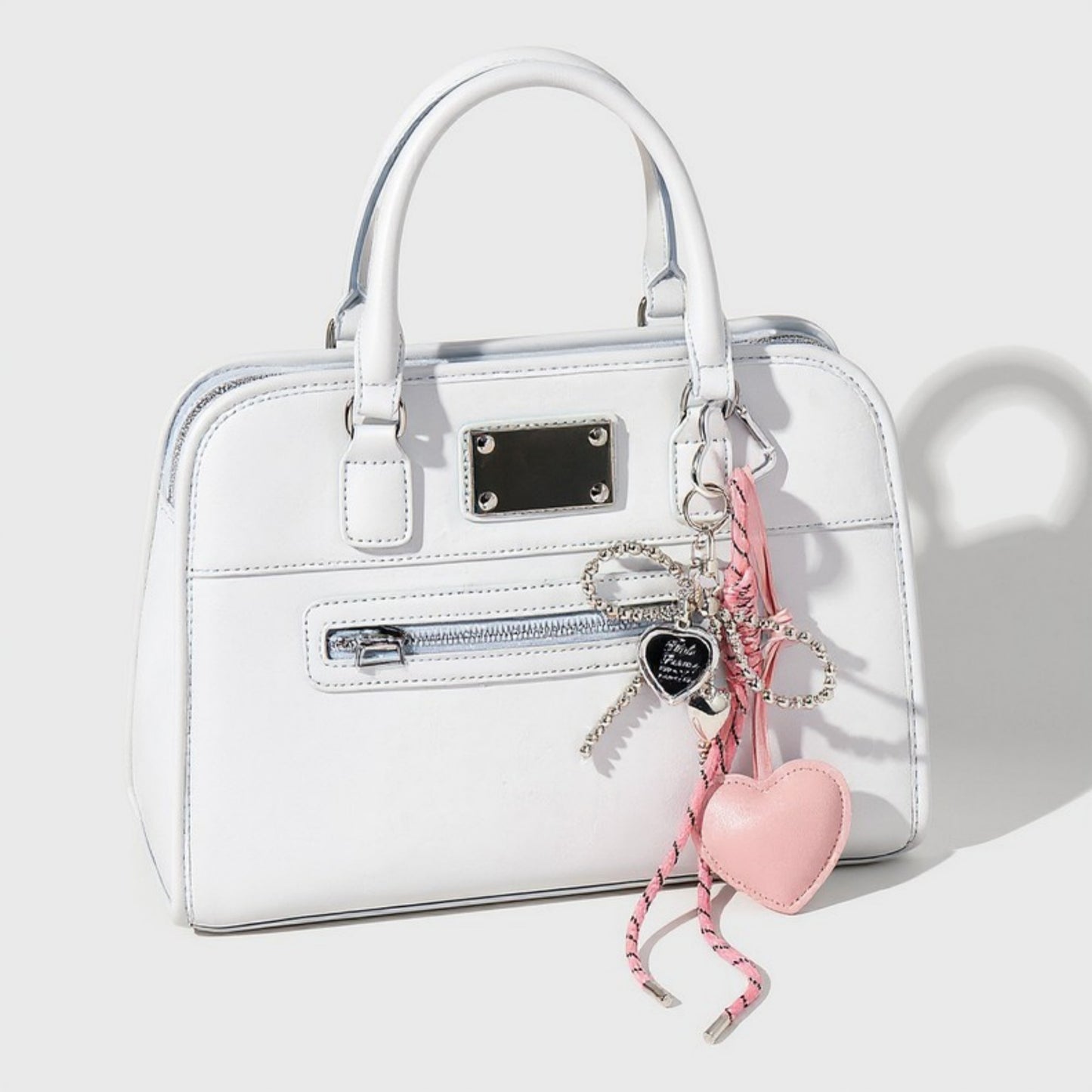 Anna-Kaci Heart Charm Keychain with Silver Chain Details and Bow Accent