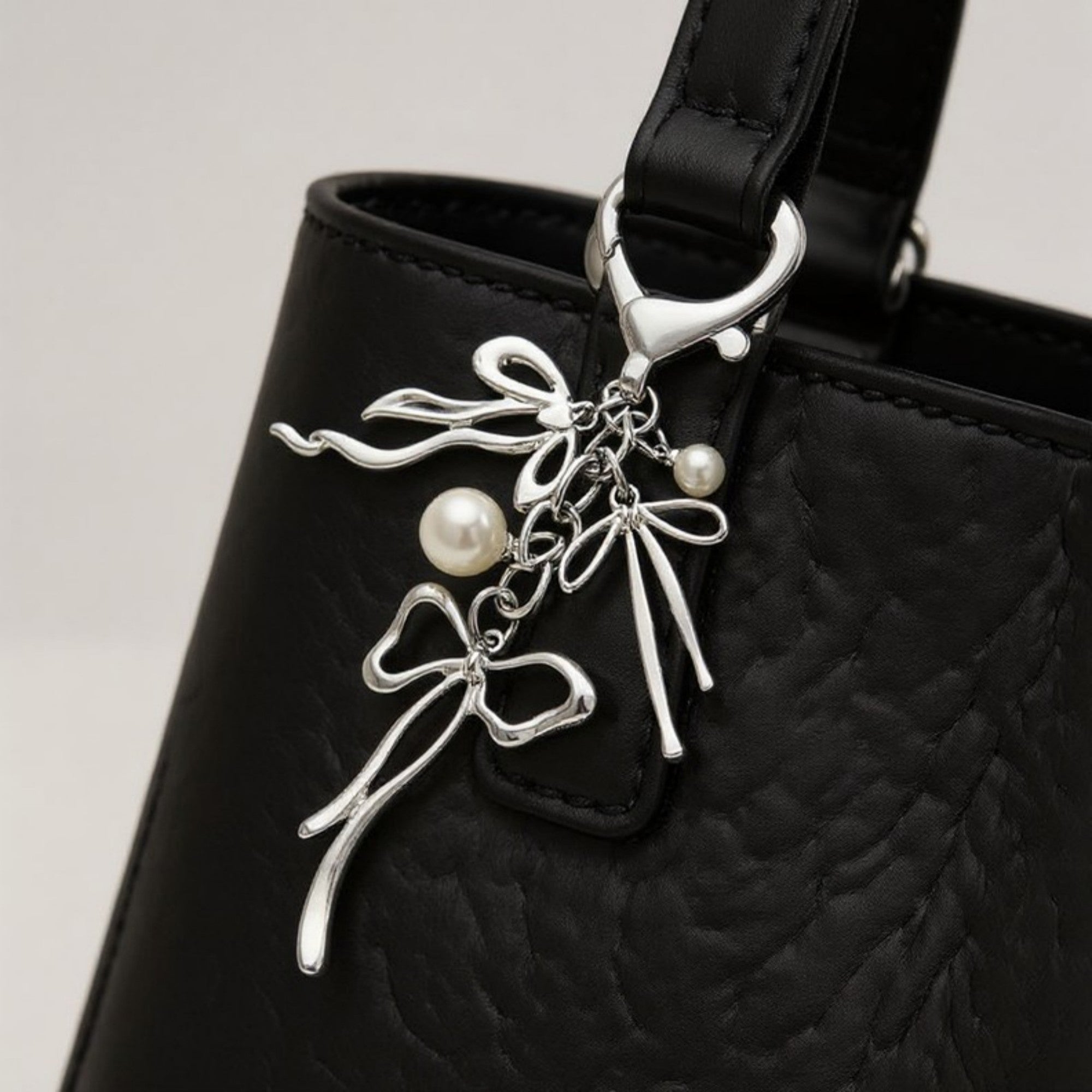 Anna-Kaci Silver Bow Keychain with Pearl Charms and Heart Clasp Accent