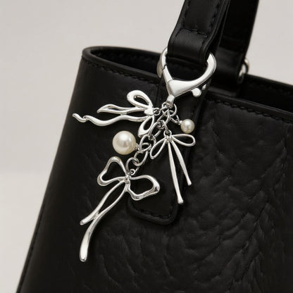 Anna-Kaci Silver Bow Keychain with Pearl Charms and Heart Clasp Accent