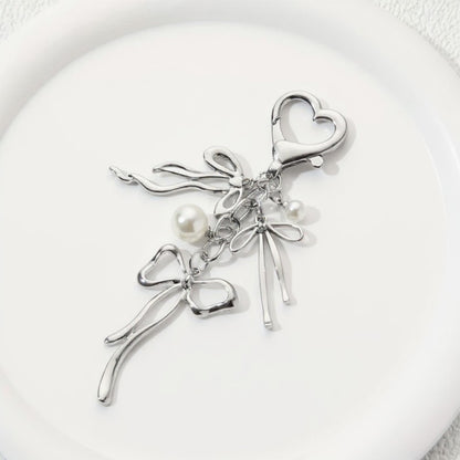 Anna-Kaci Silver Bow Keychain with Pearl Charms and Heart Clasp Accent
