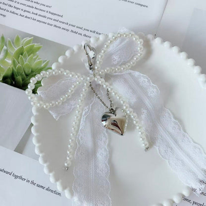 Anna-Kaci Lace Bow Charm Keychain with Pearl Trim and Silver Heart Pendant