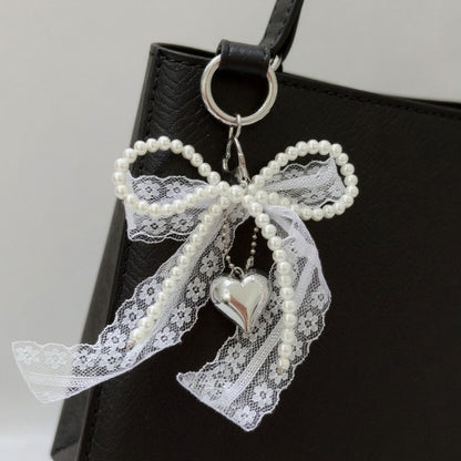 Anna-Kaci Lace Bow Charm Keychain with Pearl Trim and Silver Heart Pendant