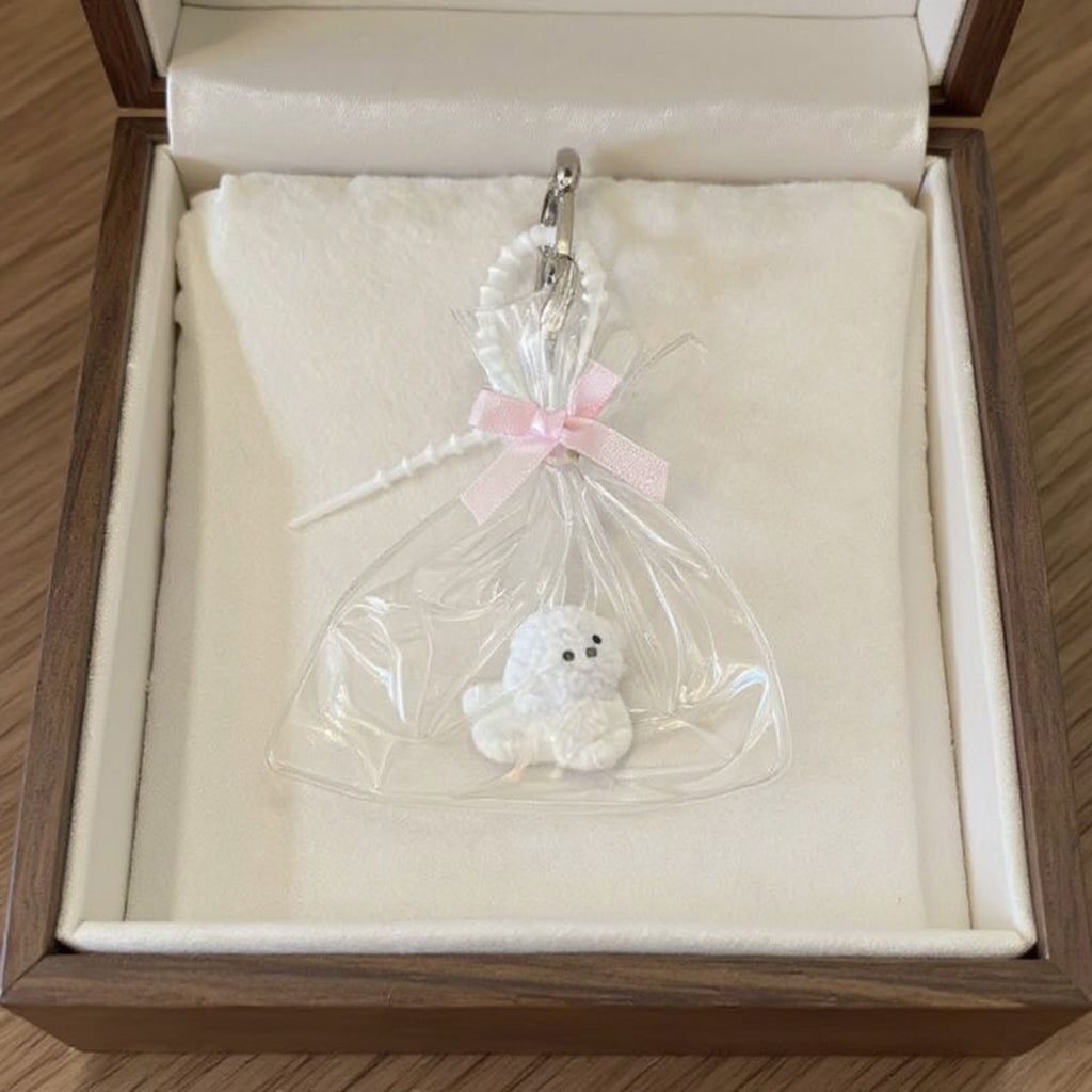 Anna-Kaci Clear Bow Bag Charm with White Puppy Figurine and Keychain Clip