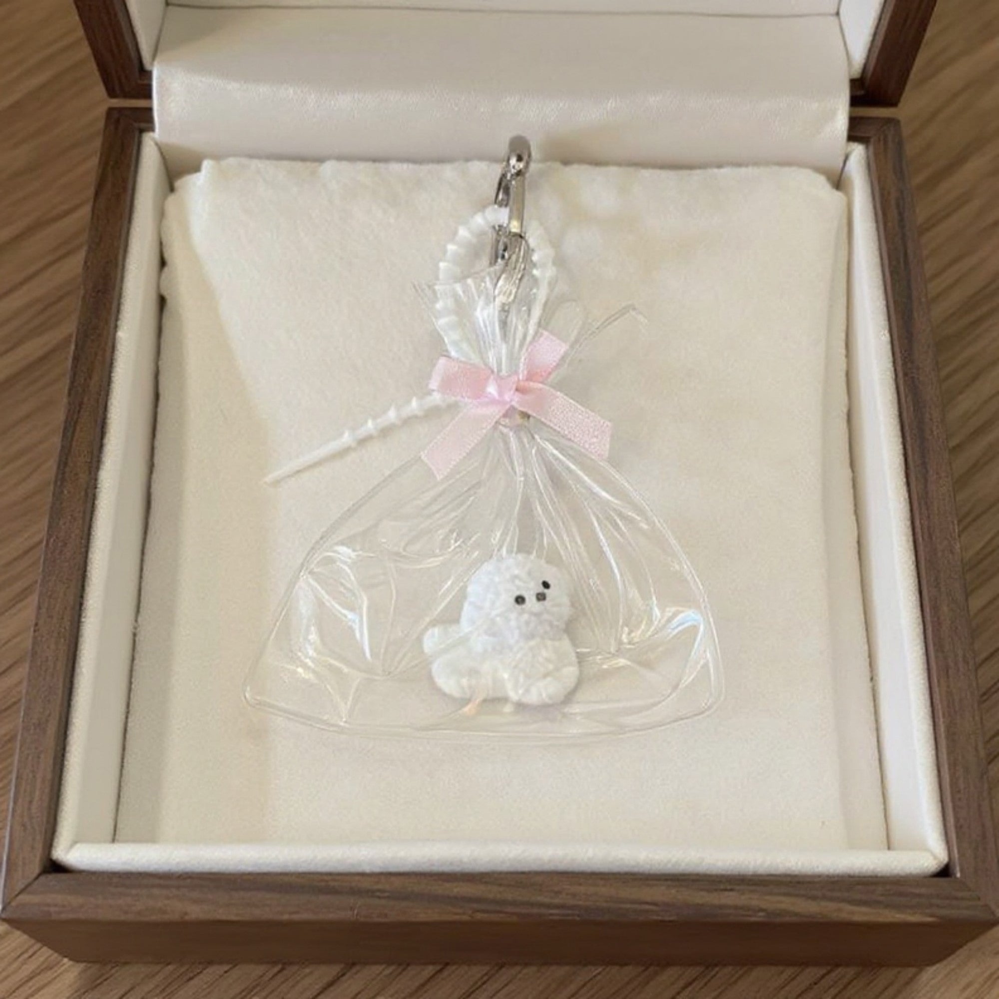 Anna-Kaci Clear Bow Bag Charm with White Puppy Figurine and Keychain Clip