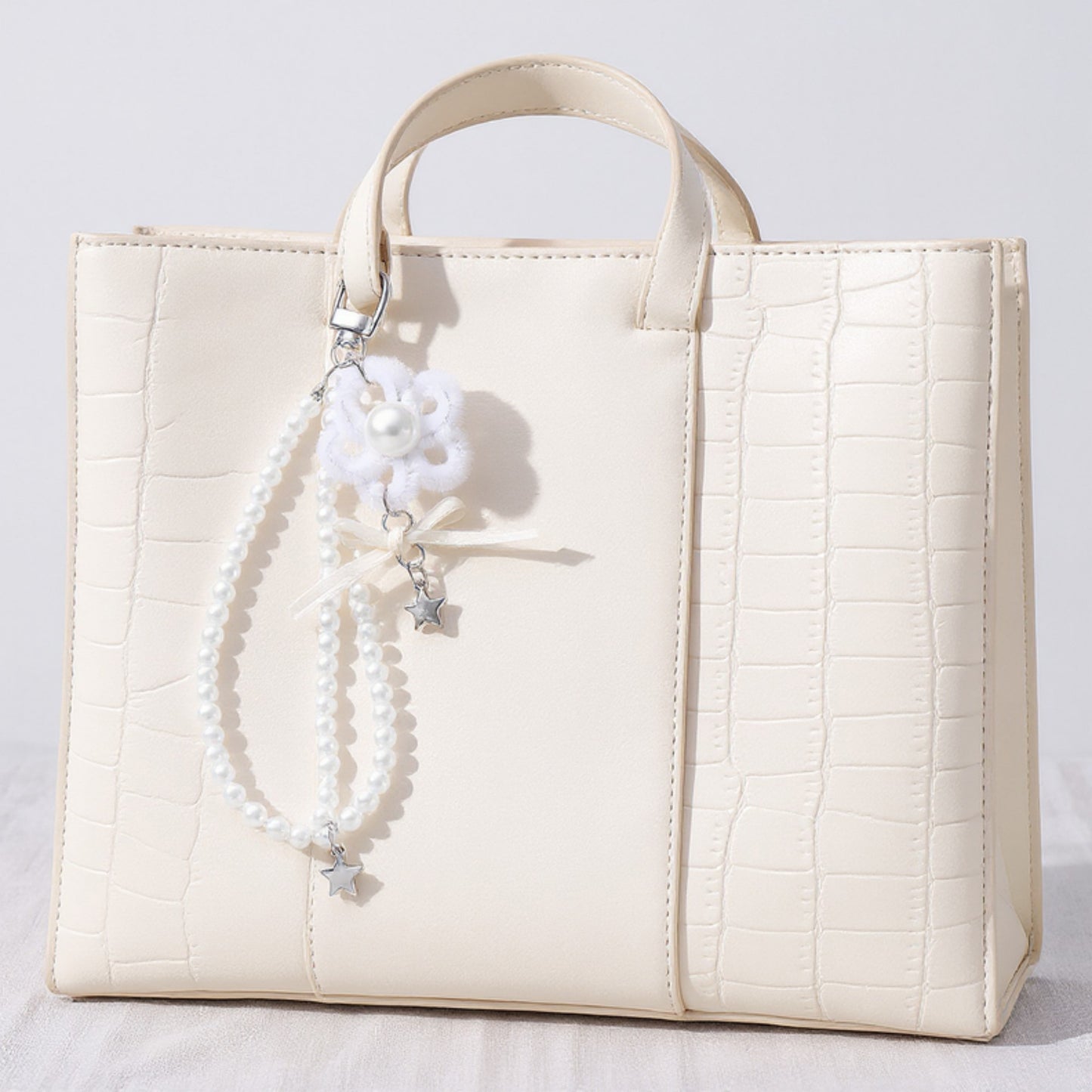 Anna-Kaci Pearl Beaded Keychain with Ribbon Bow and Star Charms