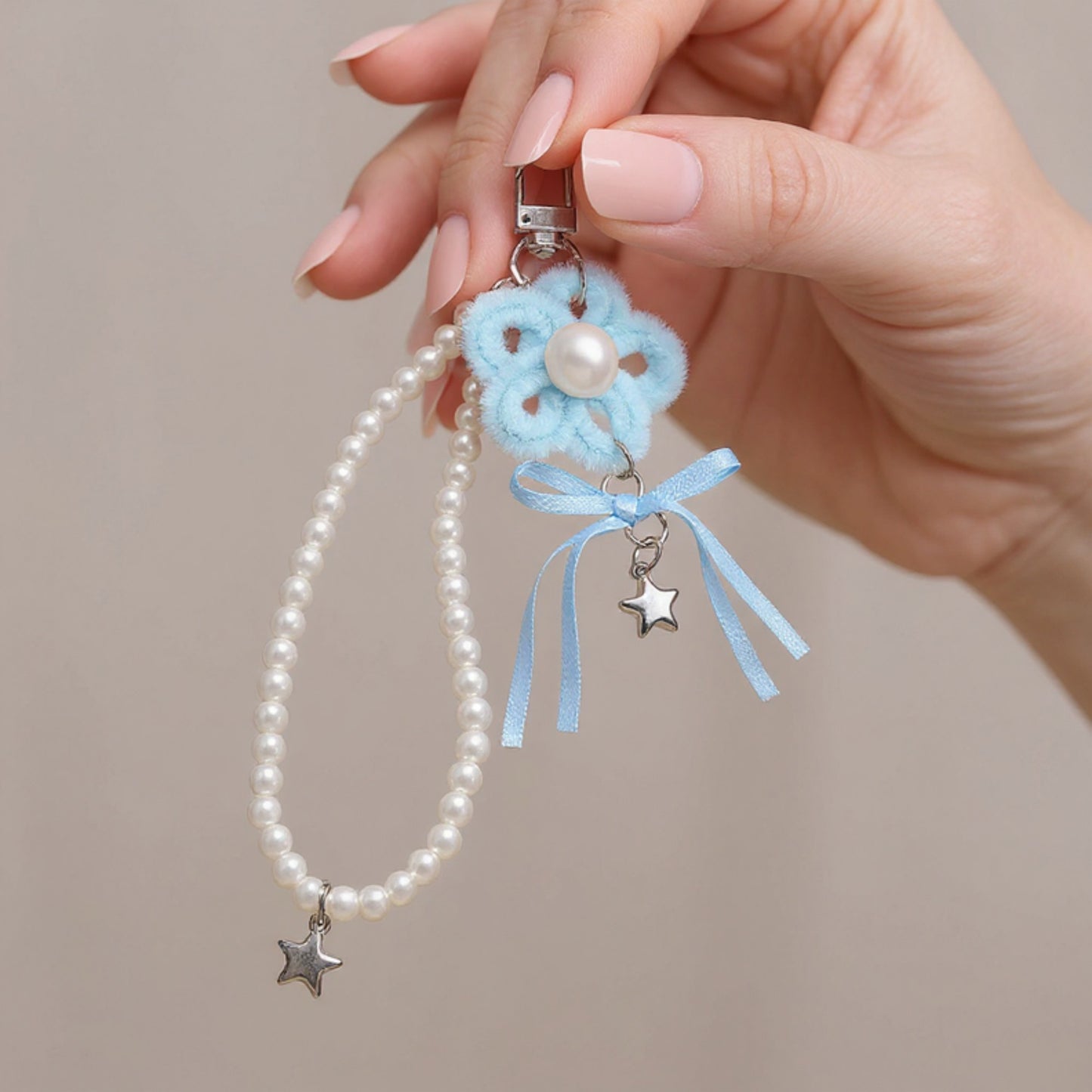 Anna-Kaci Pearl Beaded Keychain with Ribbon Bow and Star Charms